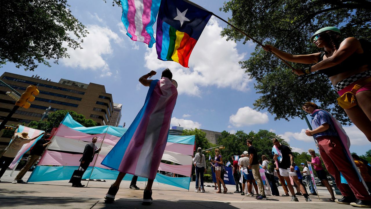 Demonstrators gather on the steps to the Texas Capitol to speak against transgender-related legislation bills being considered in the Texas Senate and House, May 20, 2021, in Austin, Texas. 