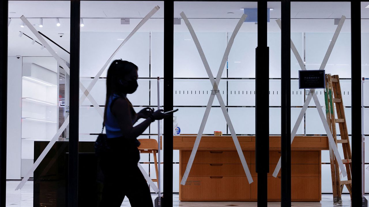 Windows are taped in anticipation of Typhoon Saola at a store in Hong Kong on August 31.