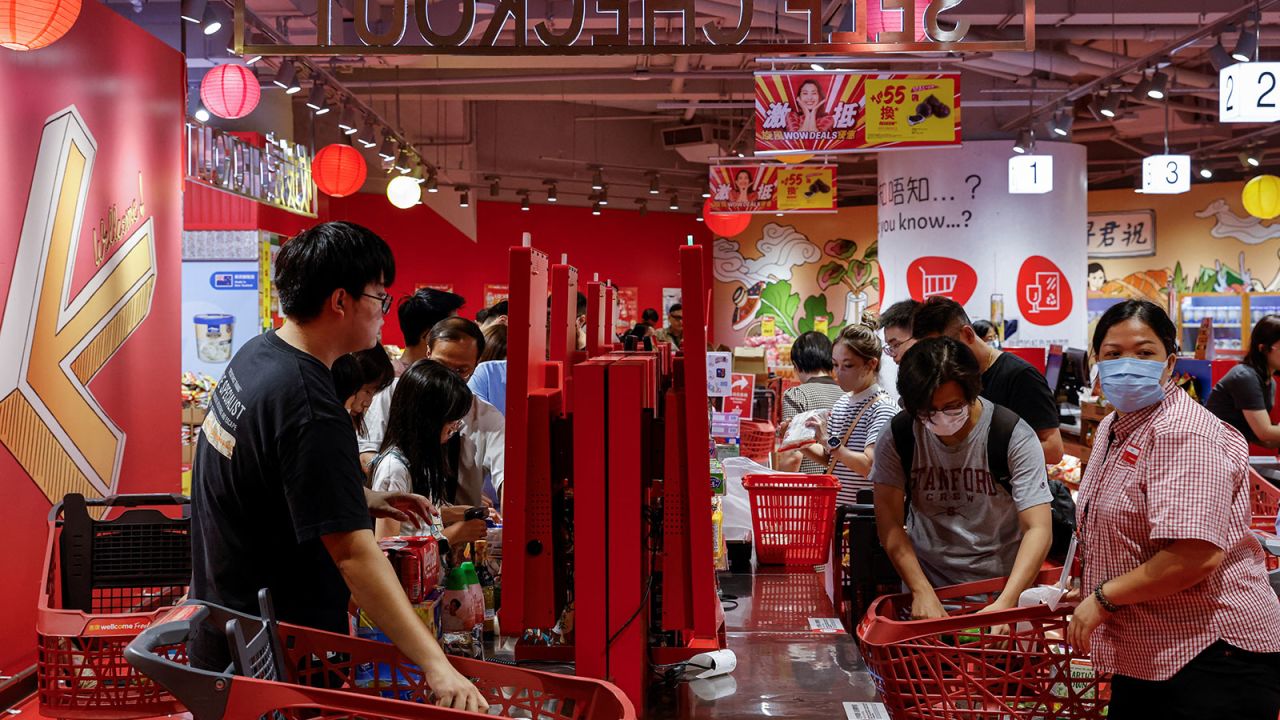 Hong Kong residents stock up as Typhoon Saola approaches on August 31.