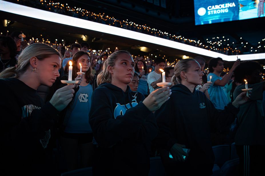University of North Carolina students and faculty hold a vigil for <a href="https://www.cnn.com/2023/08/29/us/unc-chapel-hill-campus-shooting-tuesday/index.html" target="_blank">slain professor Zijie Yan</a> in Chapel Hill, North Carolina, on Wednesday, August 30. Yan, an associate professor in the department of Applied Physical Sciences, was shot and killed in a building on UNC's campus on Monday. The suspect, graduate student Tailei Qi, was charged with first-degree murder in court Tuesday. He did not enter a plea and was ordered held without bond.
