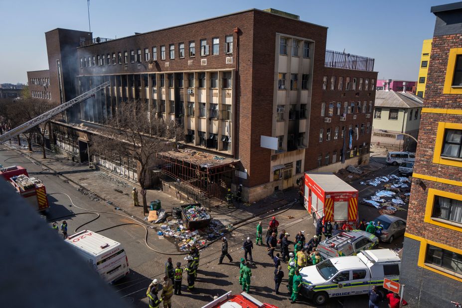 Fire and emergency personnel work on the scene of a <a href="https://www.cnn.com/2023/08/31/africa/johannesburg-fire-south-africa-death-intl-hnk/index.html" target="_blank">deadly fire</a> in a building in downtown Johannesburg on Thursday, August 31. At least 74 people have died and dozens more were injured after the fire tore through the five-story building that had been turned into informal housing.