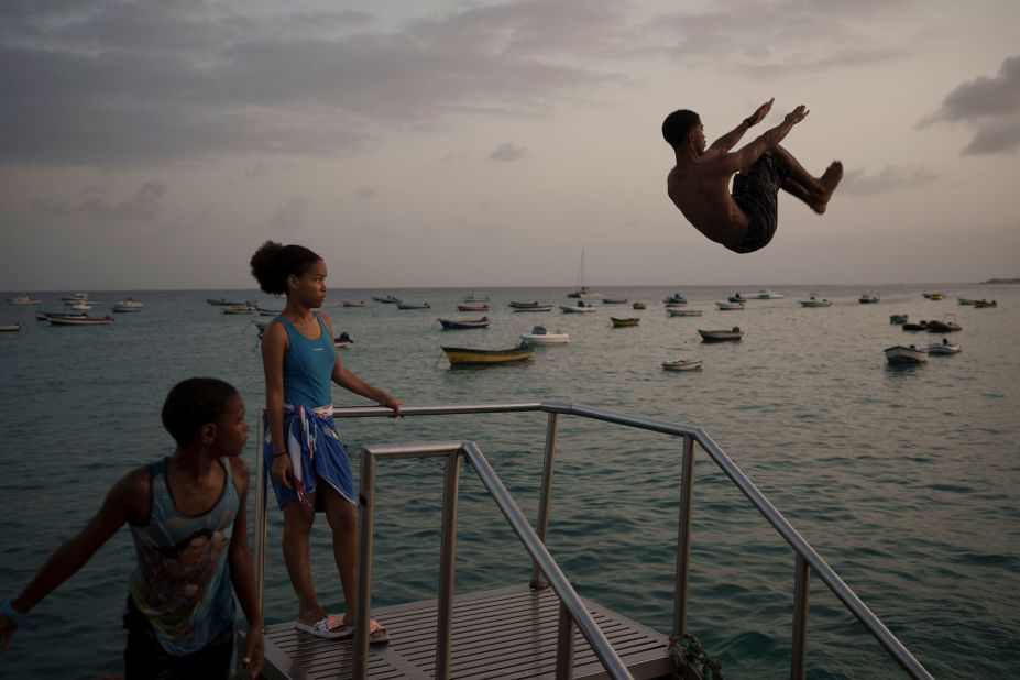 A man jumps into the water at a beach in Santa Maria on the island of Sal in Cape Verde on Thursday, August 24. <a href="https://www.cnn.com/2023/08/24/world/gallery/photos-this-week-august-17-august-24-ctrp/index.html" target="_blank">See last week in 32 photos</a>.