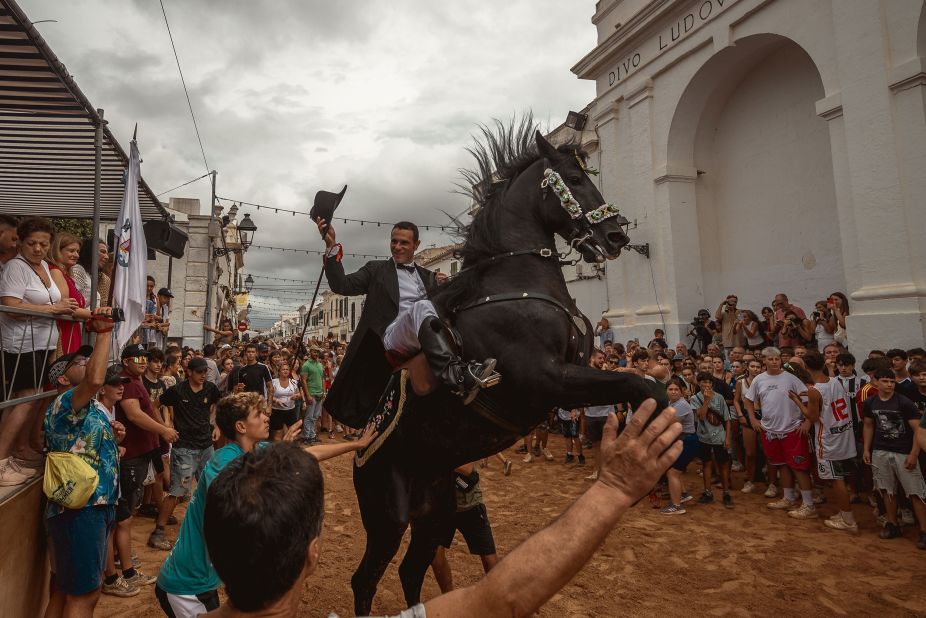 A rider rears up on his horse during the Sant Lluís Festival in Sant Lluís, in the Spanish Balearic Islands, on Sunday, August 27. 