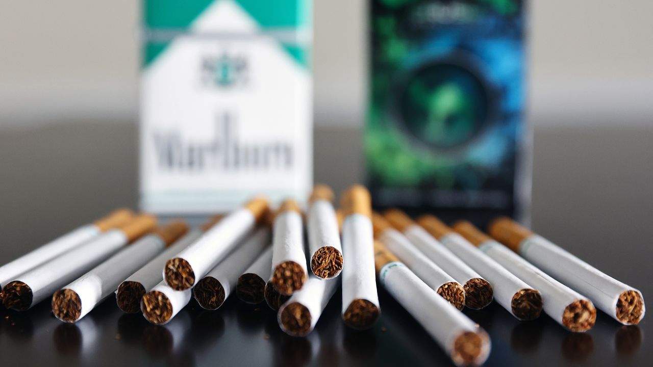In this photo illustration, menthol cigarettes sit on a table on April 28, 2022 in Los Angeles, California. The Food and Drug Administration (FDA) is proposing to ban both menthol-flavored cigarettes and flavored cigars in a move hailed by public health experts which could potentially lead to 1.3 million people quitting smoking.