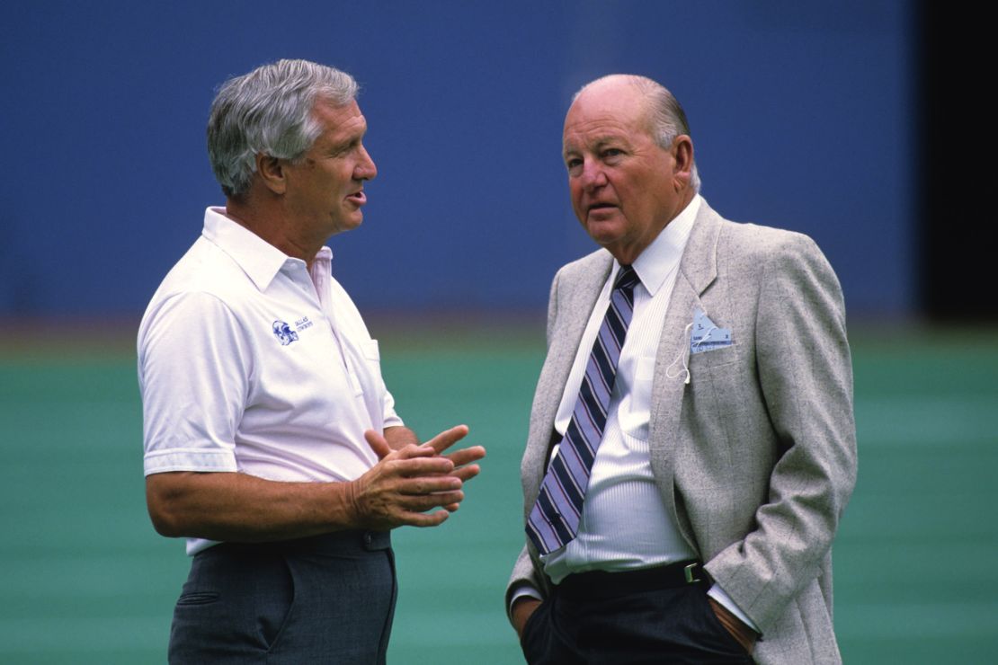 Then Cowboys Vice President of Player Personnel Brandt (L) and President and General Manager Tex Schramm talking before a game against the Pittsburgh Steelers on September 4, 1988.
