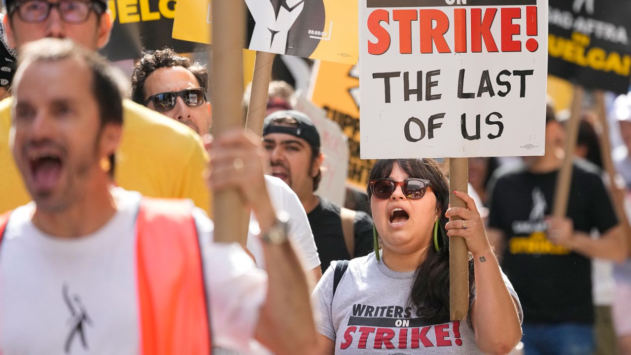 Strikers walk a picket line outside Warner Bros., Discovery, and Netflix offices in Manhattan, Friday, August 18, 2023. 