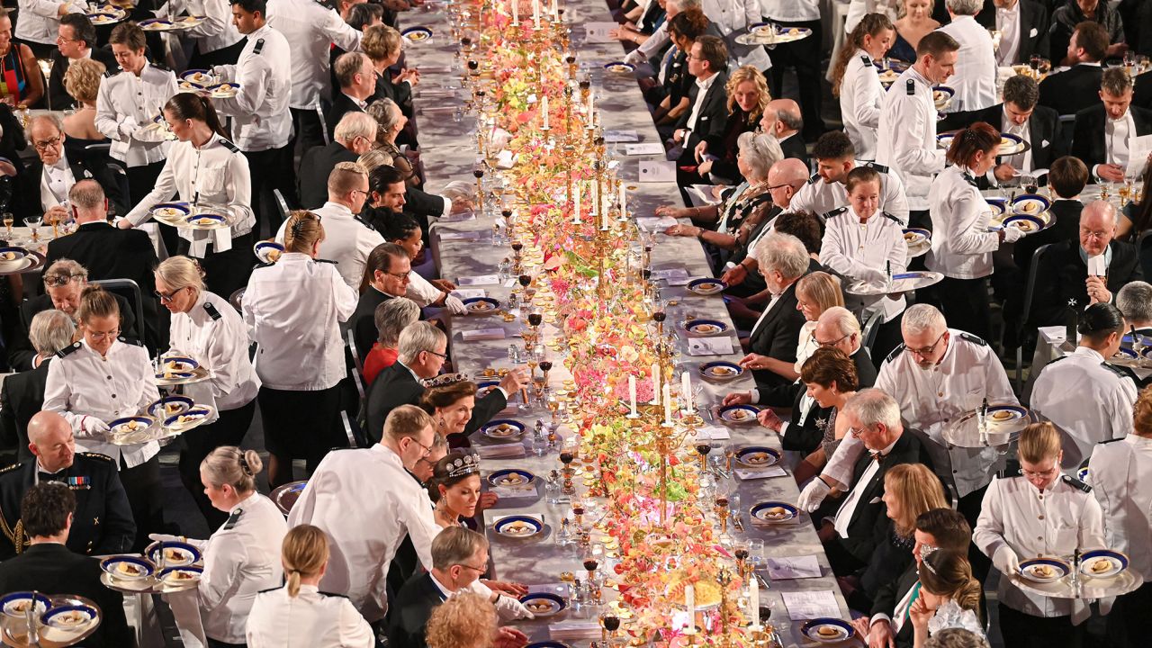 Waiters serve dessert during the Nobel Prize banquet on December 10, 2022. Russia and Belarus were not invited to that year's event.