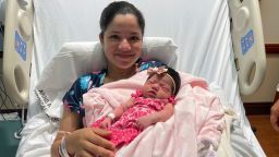 Elsa Artunez holds her newborn daughter, Yesenia Patricia