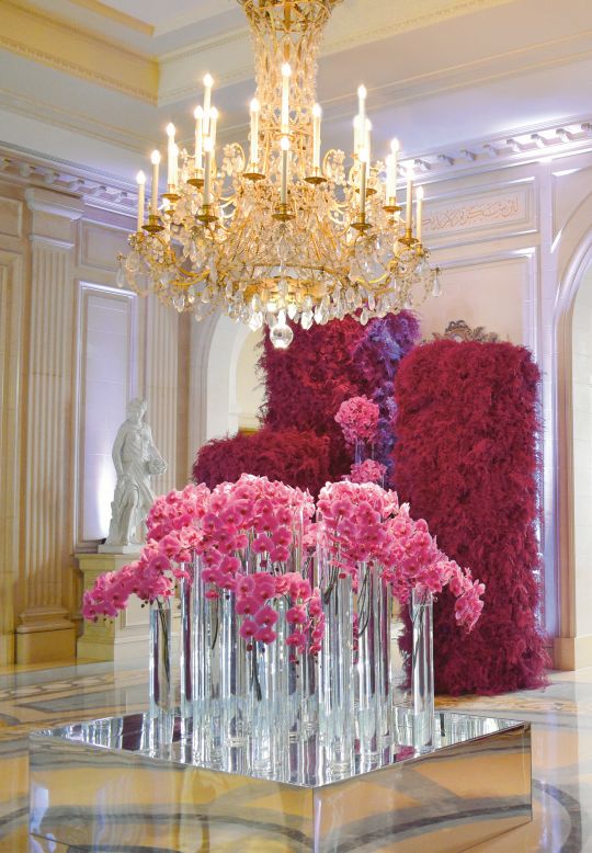 "It doesn't matter whether it's one stem or a thousand; flowers have the power to elevate a moment with elegance," Leatham writes.