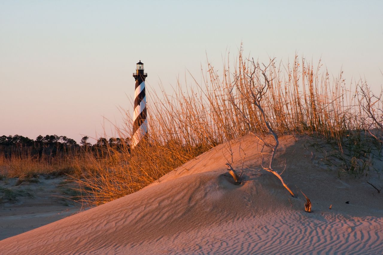 "Cape Hatteras Lighthouse, Outer banks, North Carolina, with sand dunes in foreground.See my"