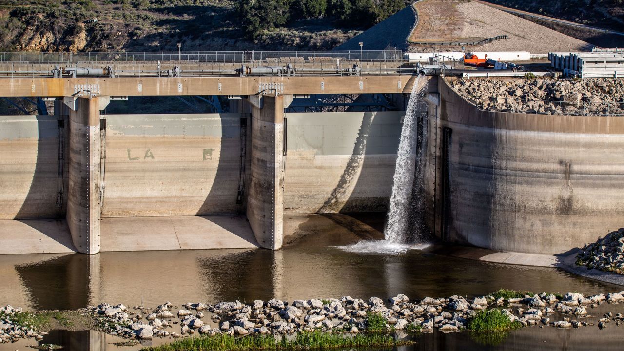 Cachuma Lake, a medium-size reservoir on California's Central Coast, releases water downstream to recharge groundwater for agriculture interests and communities in the Santa Ynez Valley in March 2022.