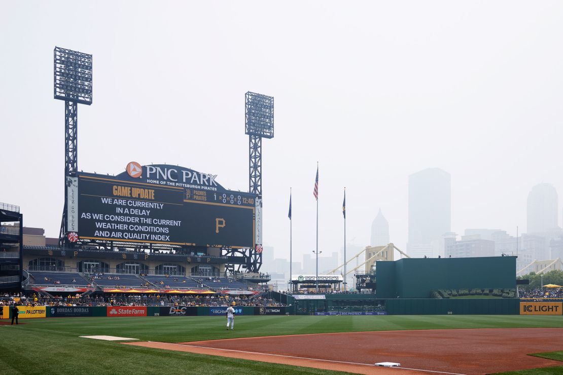An MLB game between the San Diego Padres and Pittsburgh Pirates is delayed as Canadian wildfire smoke descends on downtown Pittsburgh.
