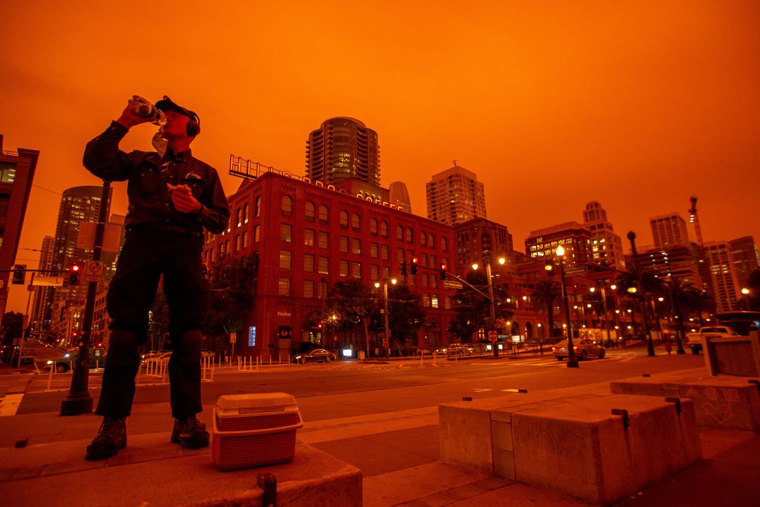 Smoke from northern California wildfires casts a reddish glow in San Francisco, California.