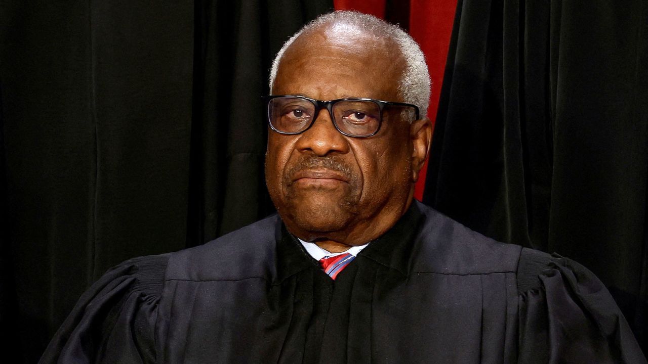 FILE PHOTO: U.S. Supreme Court Associate Justice Clarence Thomas poses during a group portrait at the Supreme Court in Washington, U.S., October 7, 2022. REUTERS/Evelyn Hockstein/File Photo