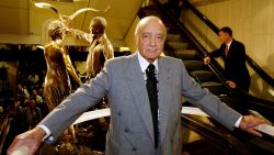FILE PHOTO: Harrods chairman Mohamed Al Fayed unveils a memorial to his son Dodi and Britain's Diana Princess of Wales at Harrods in London. Harrods chairman Mohamed Al Fayed (C) unveils a memorial (L) to his son Dodi and Britain's Diana, Princess of Wales at Harrods in London, September 1, 2005. REUTERS/Paul Hackett/File Photo