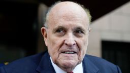 Former Mayor of New York Rudy Giuliani speaks to reporters as he leaves his apartment building in New York, Wednesday, Aug. 23, 2023. (AP Photo/Seth Wenig)