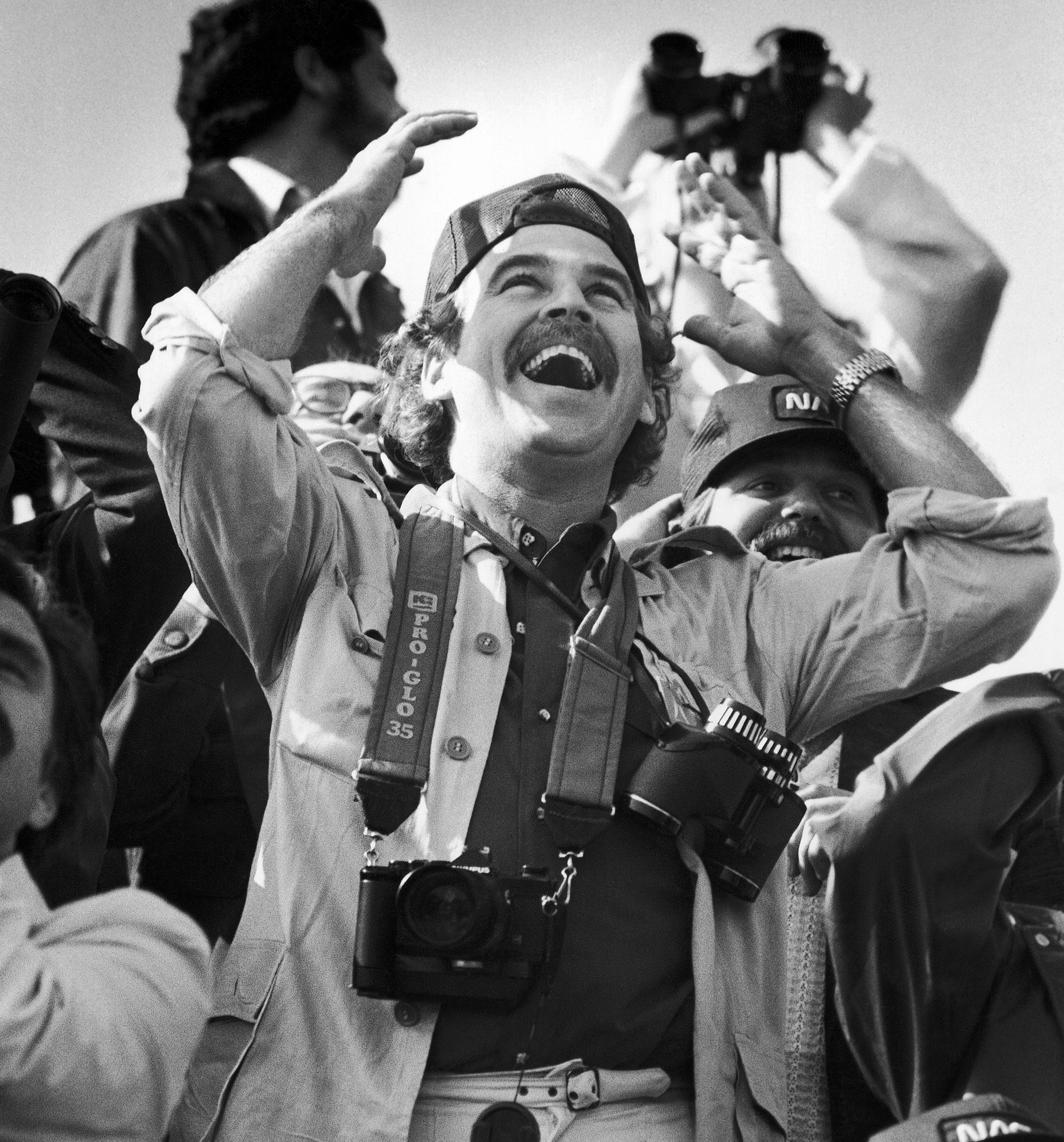 Jimmy Buffett reacts as he watches the space shuttle launch at the Kennedy Space Center in 1981.