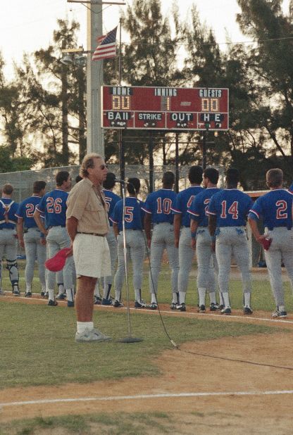 Buffett sings the national anthem to kick off a Miami Miracle game in 1989. Buffet was part-owner of the minor league team.
