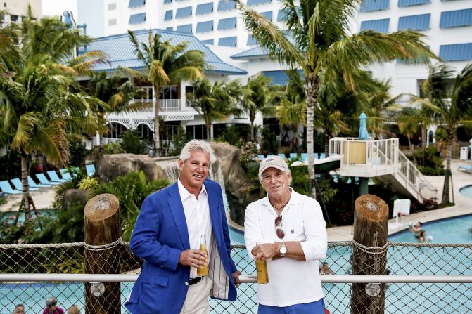Buffett poses with business partner John Cohlan at the Margaritaville resort in Hollywood, Florida in 2016.