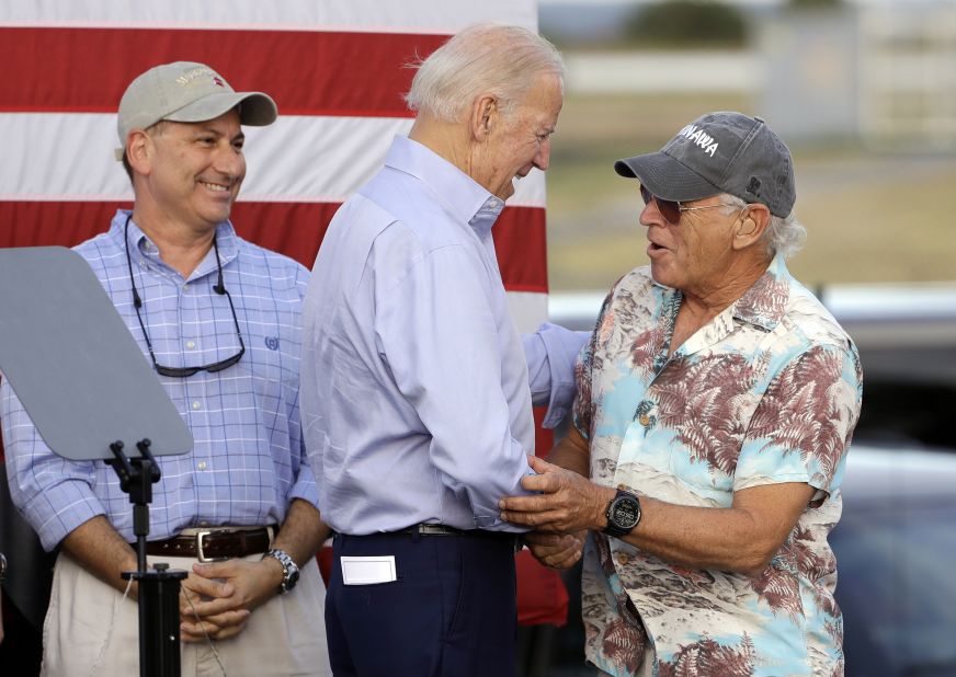 Vice President Joe Biden shakes hands with Buffett at a campaign event for presidential candidate Hillary Clinton in 2016.
