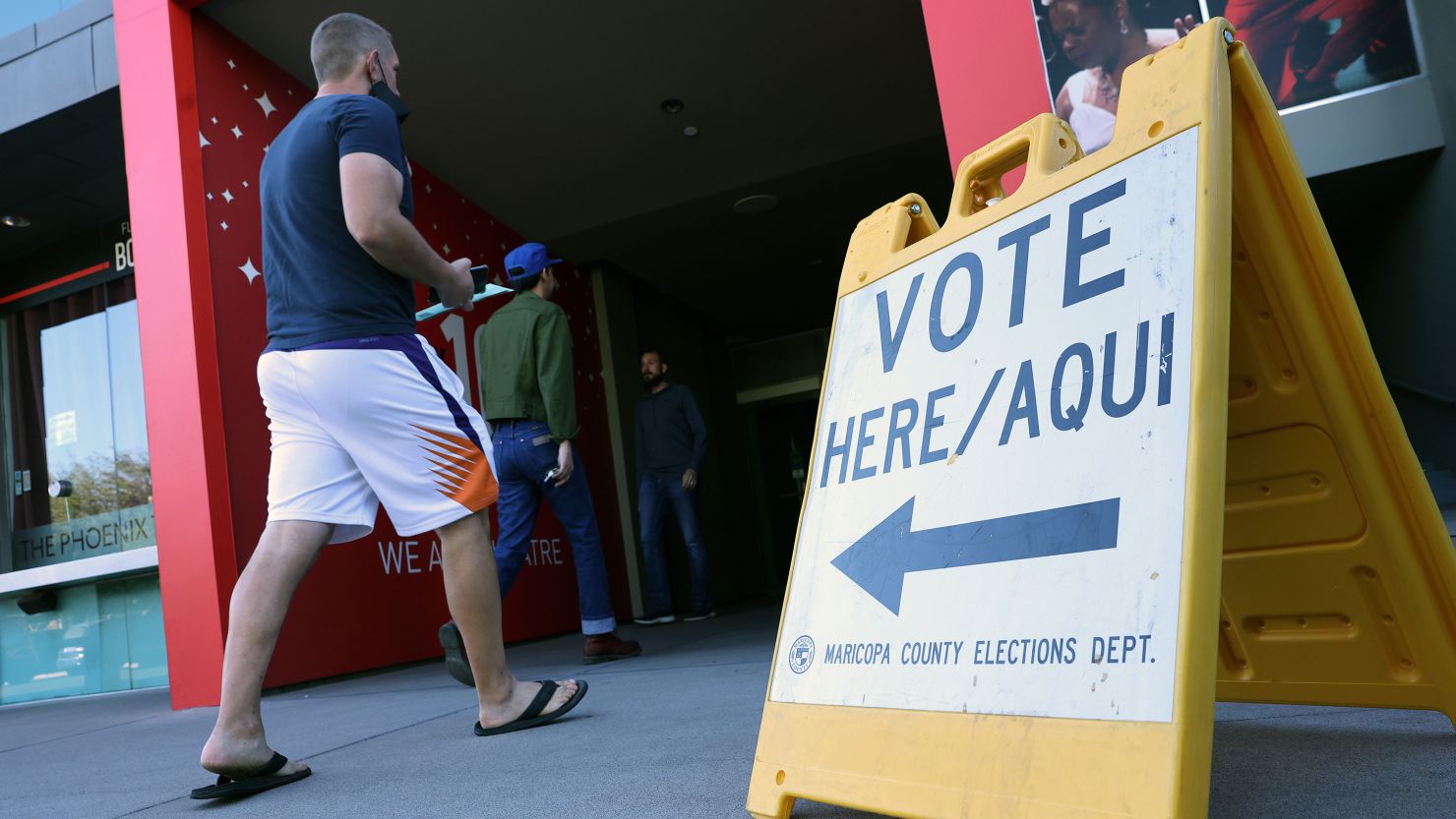 Voters arrive to cast their ballots at the Phoenix Art Museum on November 8, 2022.