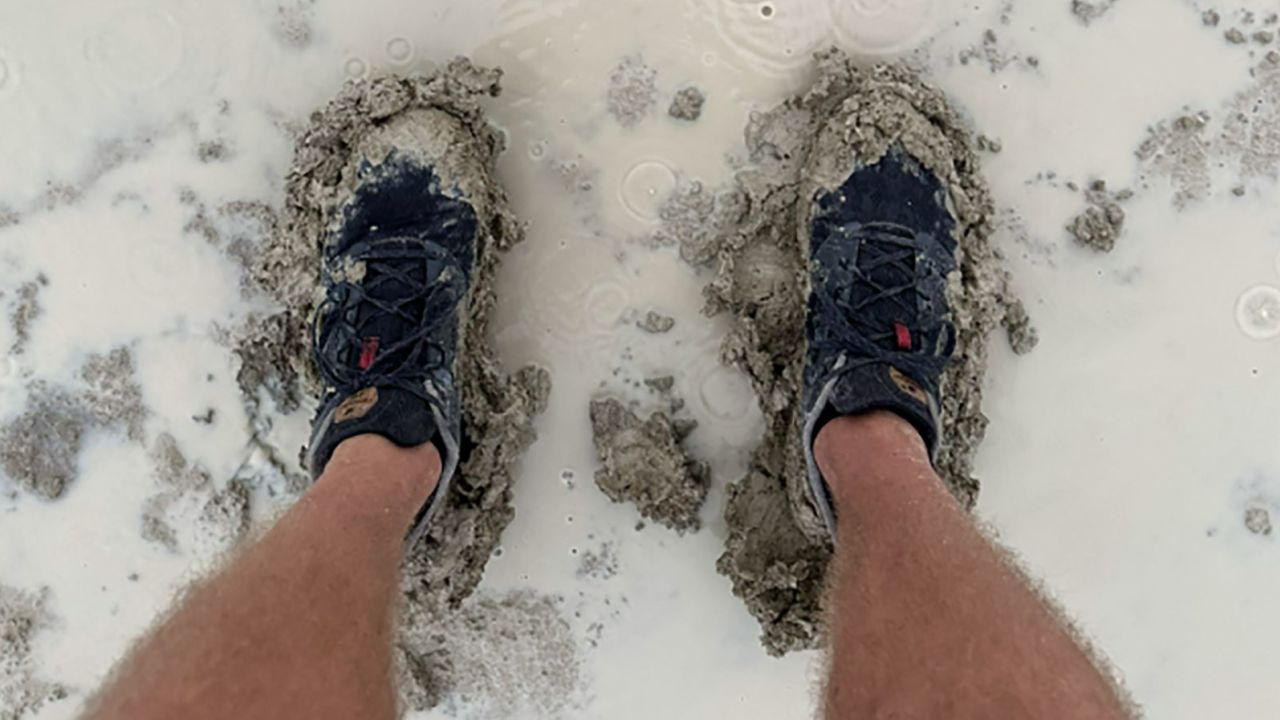 Heavy rain covered the ground in thick mud at Burning Man in the Black Rock Desert.