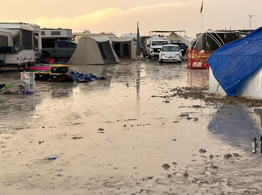 Mud fills a Burning Man campsite after heavy rain in Nevada's Black Rock Desert on September 1, 2023.