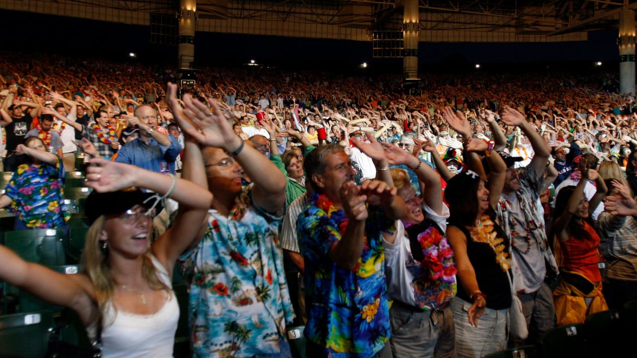Jimmy Buffett Parrothead fans sway to the music at a sold out Tweeter Center in Mansfield, Mass., Thursday, Aug. 10, 2006. (AP Photo/Robert E. Klein)