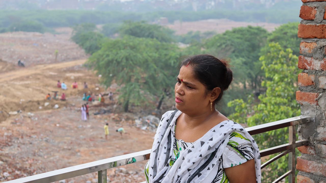 Savita looks at what was her home seven years ago. 