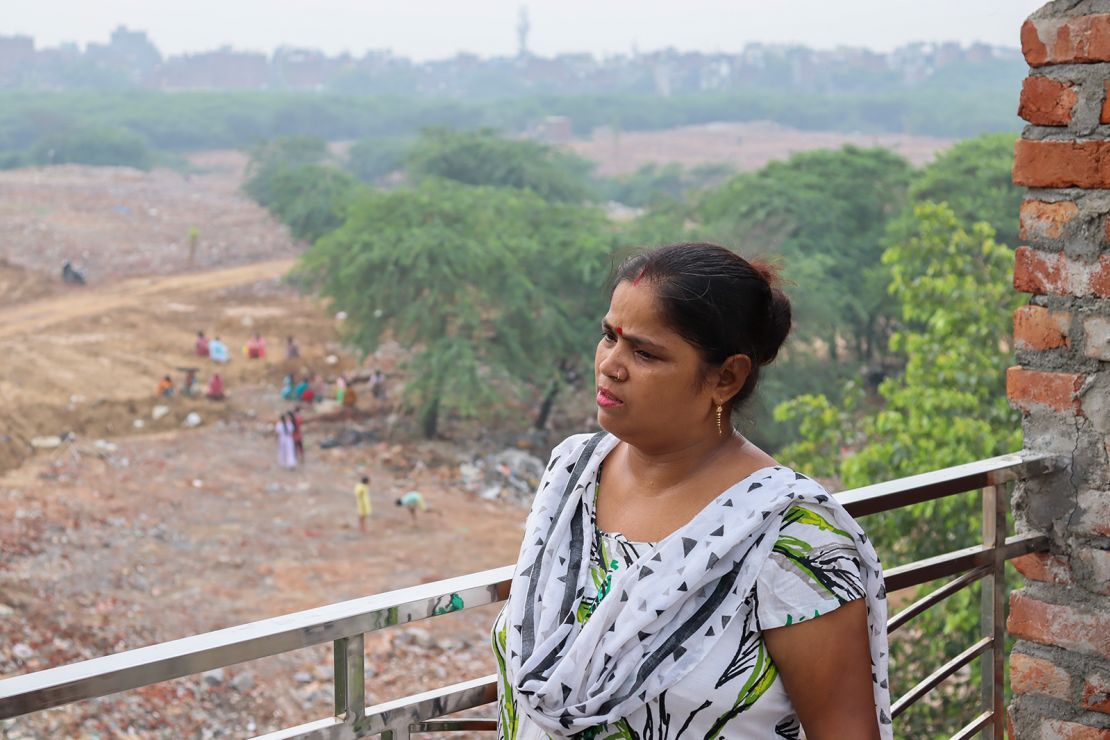 Savita looks over what was once her home of seven years. 