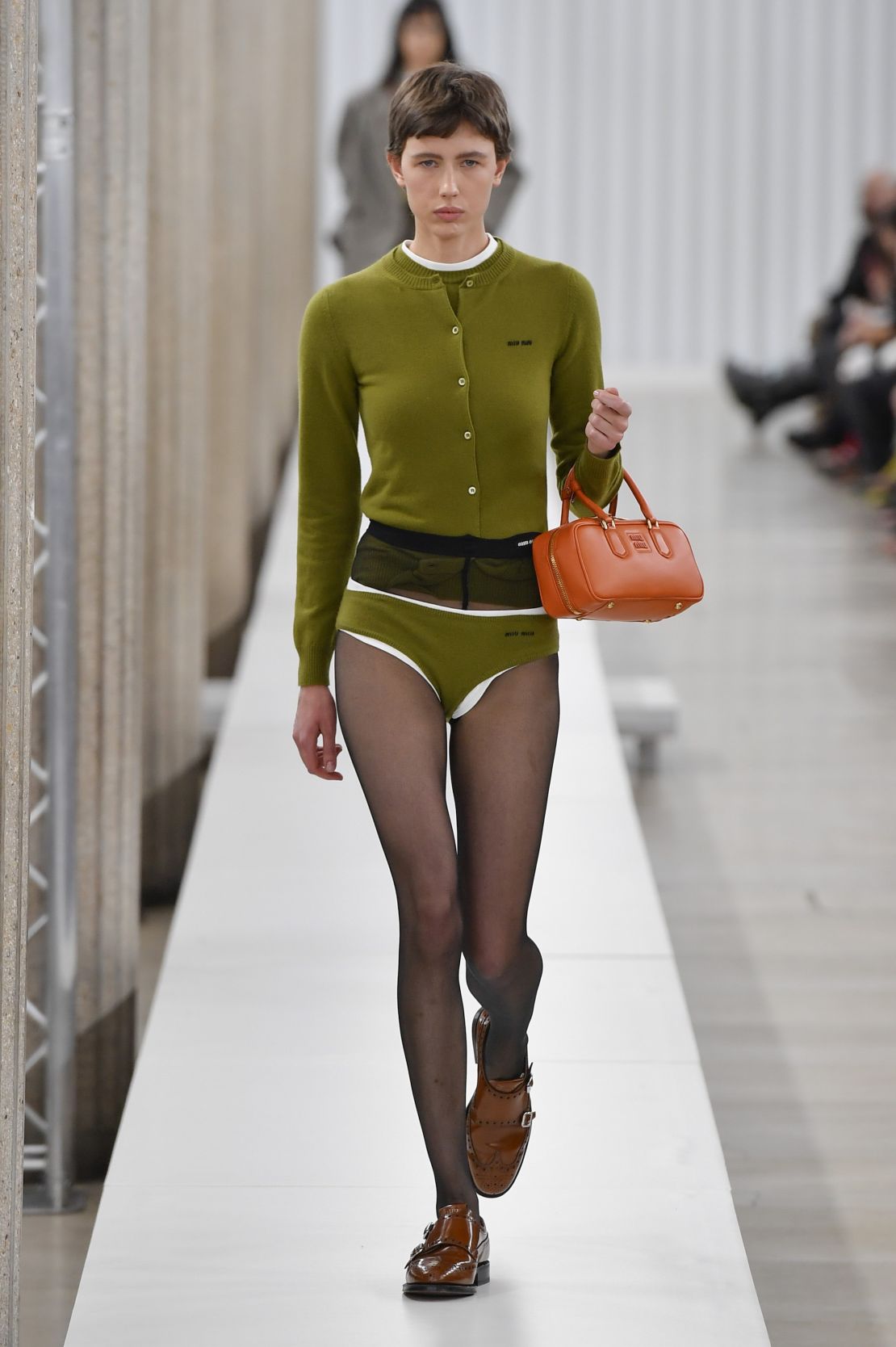 A model walks the runway during the Miu Miu Ready to Wear Fall/Winter 2023-2024 fashion show during Paris Fashion Week in March 2023.