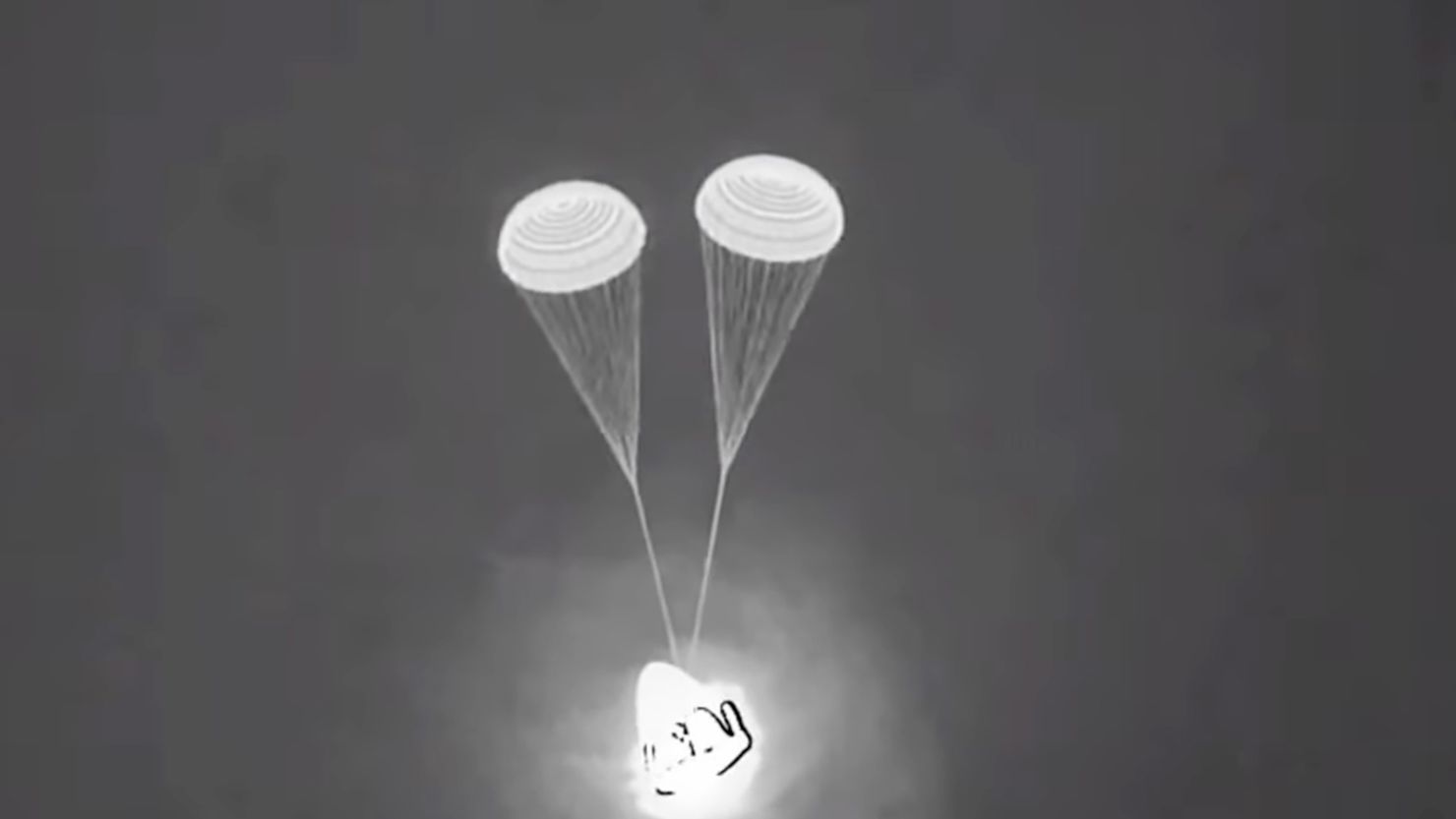 The SpaceX Crew Dragon capsule deployed parachutes to slow its descent before splashing down off the coast of Florida on Monday.