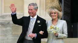 Britain's Prince Charles and The Duchess of Cornwall leave St. George's Chapel in Windsor Castle, southern England, following the Service of Prayer and Dedication following their marriage, April 9, 2005. Prince Charles and his long-term partner Camilla Parker Bowles, who became Her Royal Highness the Duchess of Cornwall on their marriage, married on Saturday in a low-key ceremony. REUTERS/Toby Melville TM/CRB/SM