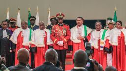 Gabon's new strongman General Brice Oligui Nguema (C) looks on as he is inaugurated as Gabon's interim President, in Libreville on September 4, 2023. Gabon's coup leader vowed after being sworn in as interim president on September 4, 2023 to restore civilian rule through "free, transparent and credible elections" after a transition and amnesty prisoners of conscience. (Photo by AFP) (Photo by -/AFP via Getty Images)