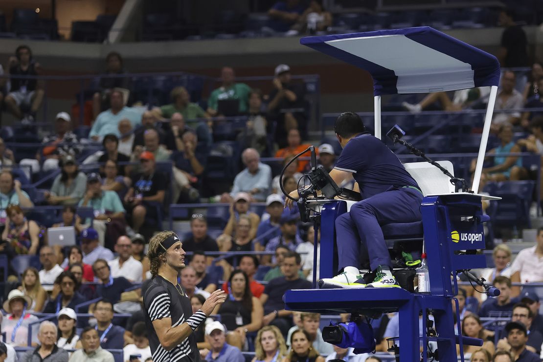 Alexander Zverev speaks with the Chair Umpire during a men's singles match at the 2023 US Open, Monday, Sep. 4, 2023 in Flushing, NY. (Brad Penner/USTA via AP)