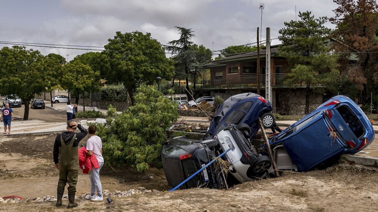Vehicles lie piled up after flooding caused by Storm Dana, on September 4, 2023, in El Álamo, Madrid.