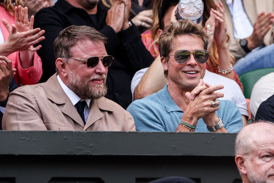 LONDON, ENGLAND - JULY 16: Guy Ritchie (L) and Brad Pitt (C) look on during the Men's Single final match between Novak Djokovic of Serbia and Carlos Alcaraz of Spain during day fourteen of The Championships Wimbledon 2023 at All England Lawn Tennis and Croquet Club on July 16, 2023 in London, England. (Photo by Shi Tang/Getty Images)