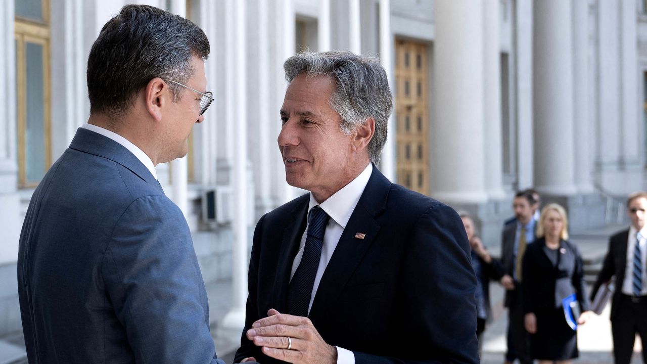 Ukraine's Foreign Minister Dmytro Kuleba greets US Secretary of State Antony Blinken before a meeting at the Ministry of Foreign Affairs in Kyiv on September 6, 2023. 