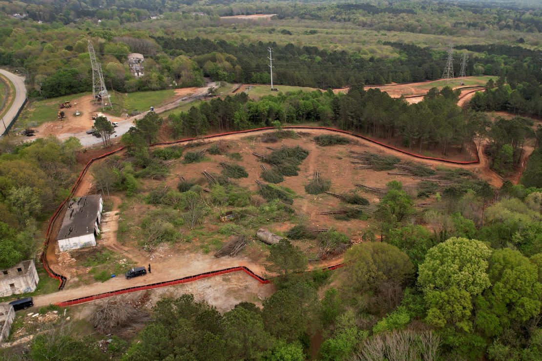 Trees lie cut down in March to make way for the training center.