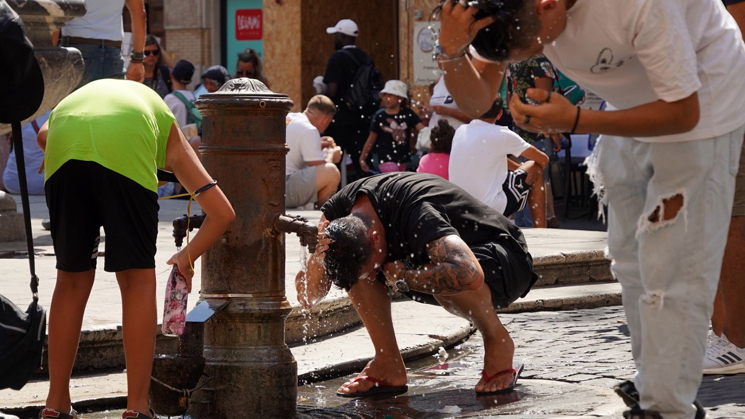 People cool off near the Pantheon in Rome, Italy, on Aug. 22, 2023. Italy experienced severe heat waves this summer.