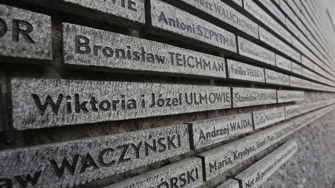 The names of Wiktoria and Jozef Ulma are seen on a commemorative wall at the Markowa Ulma-Family Museum of Poles Who Saved Jews in World War II.