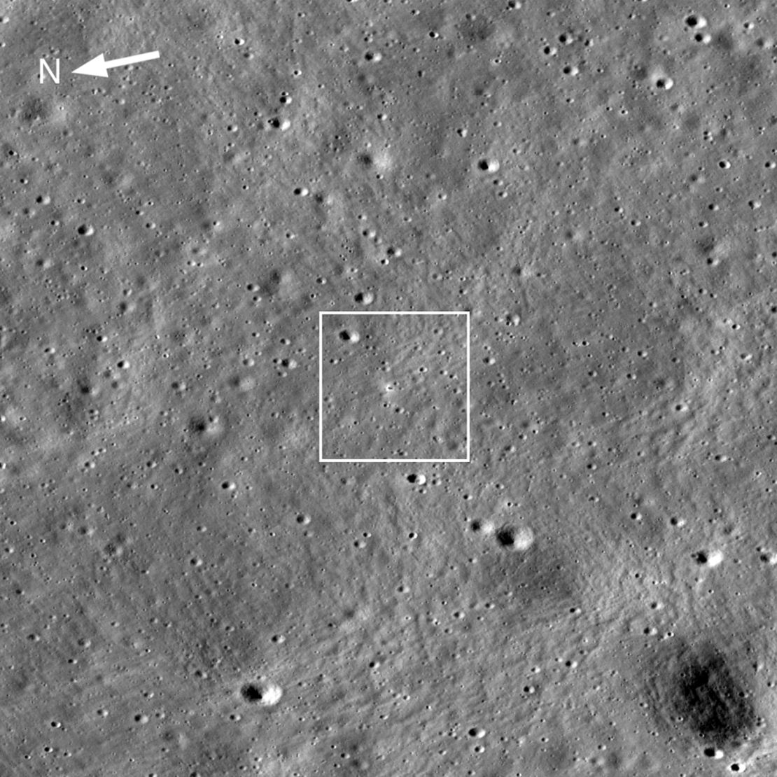 Chandrayaan-3 lander is in the center of the image, its dark shadow is visible against the bright halo surrounding the vehicle. The image is 1,738 meters wide; frame No. M1447750764LR.