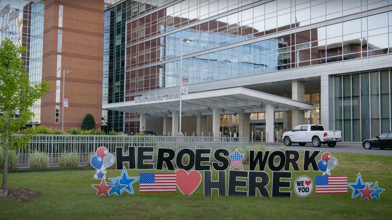 A screengrab from a UAMS promotional video shows a sign on the lawn of the university's medical center.