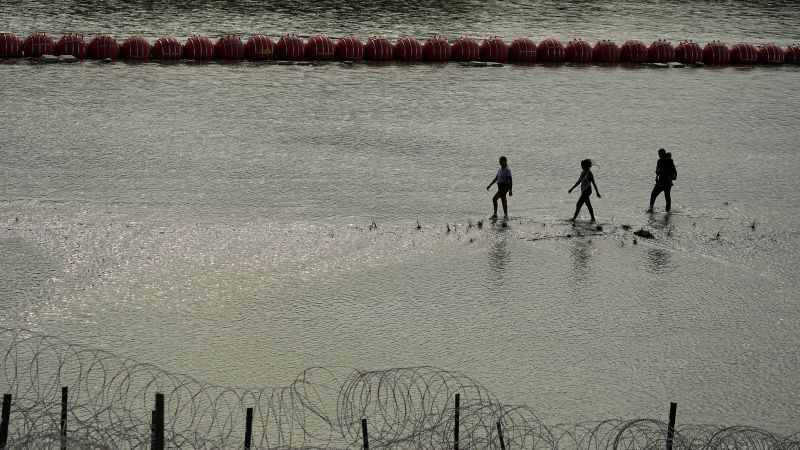 NextImg:Federal judge orders Texas to remove floating barriers aimed at deterring migrants on Rio Grande | CNN Politics