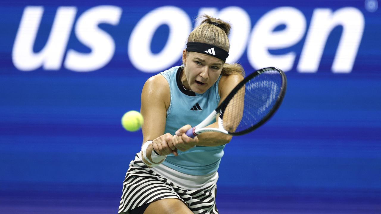 Muchová returns a shot against Sorana Cîrstea at the US Open.