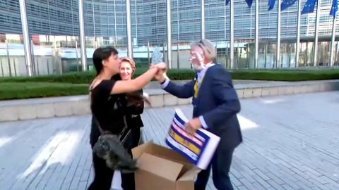 Ryanair CEO Michael O'Leary gets hit in the face by cream cakes during a press briefing outside the EU Commission, in Brussels, Belgium September 7, 2023, in this screengrab obtained from a handout video. 