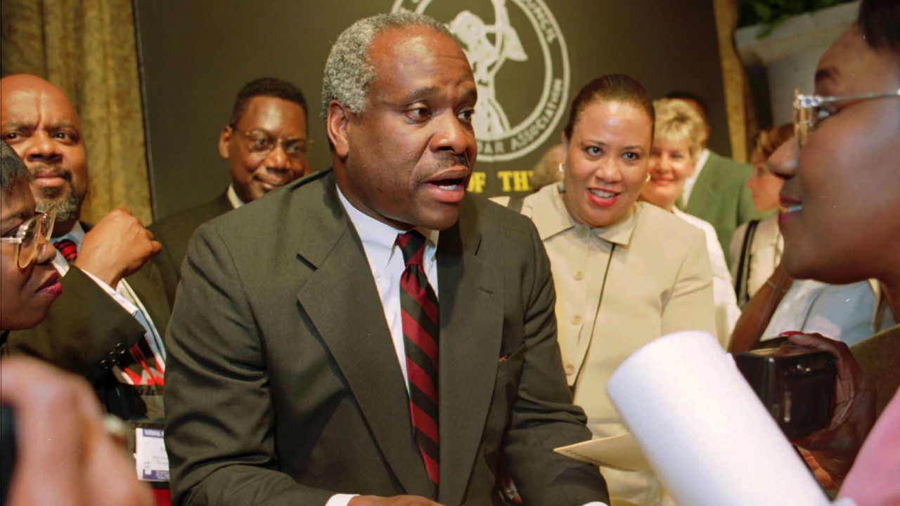 Supreme Court Justice Clarence Thomas signs autographs in Memphis on Wednesday, July 29, 1998, after addressing the National Bar Association, an organization of Black lawyers.
