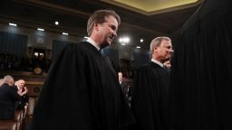 Supreme Court Associate Justice Brett Kavanaugh and Chief Justice John Roberts arrive to hear President Donald Trump deliver the State of the Union address in the House chamber on February 4, 2020 in Washington, DC.