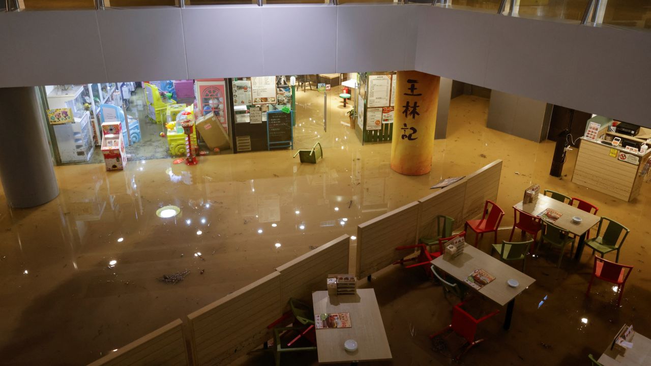 A shopping mall floods during heavy rain in Hong Kong on September 8, 2023.