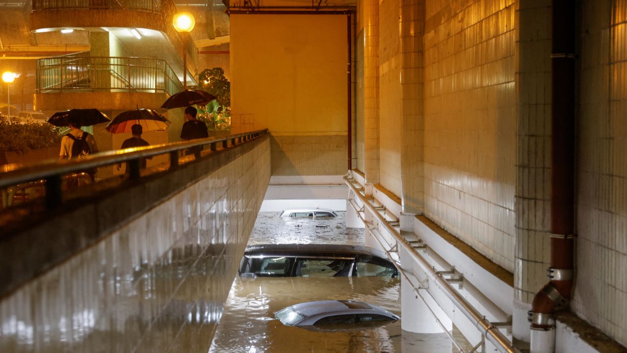 Vehicles submerged in a flooded parking lot in Hong Kong on September 8, 2023.